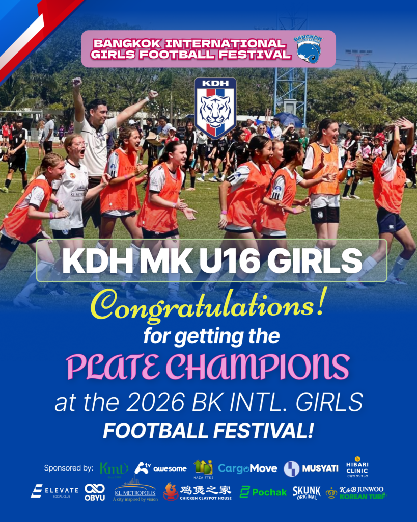 a picture of coach the his team celebrating cup win