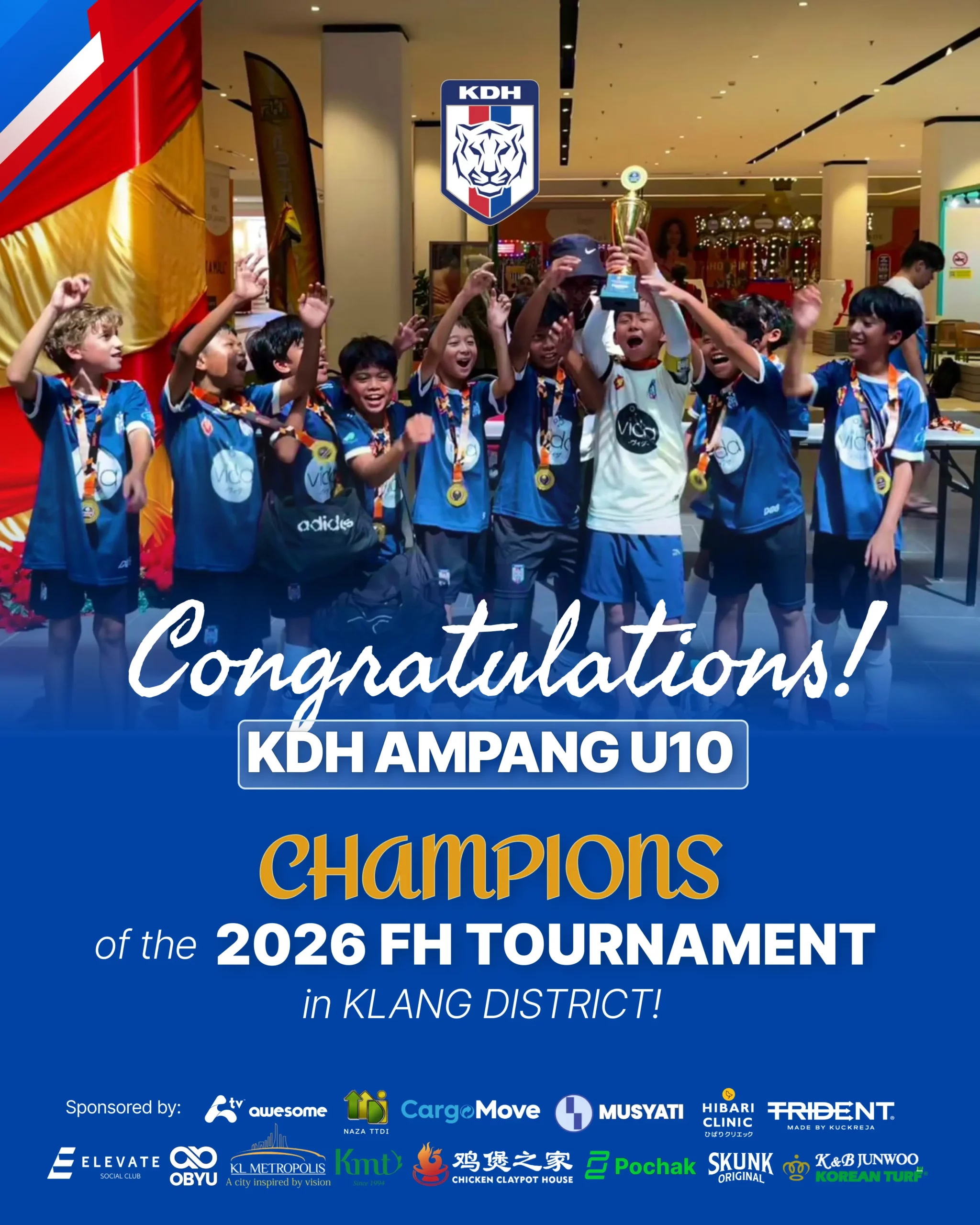 KDH Ampang U10 Football Team Raising Trophy as champions